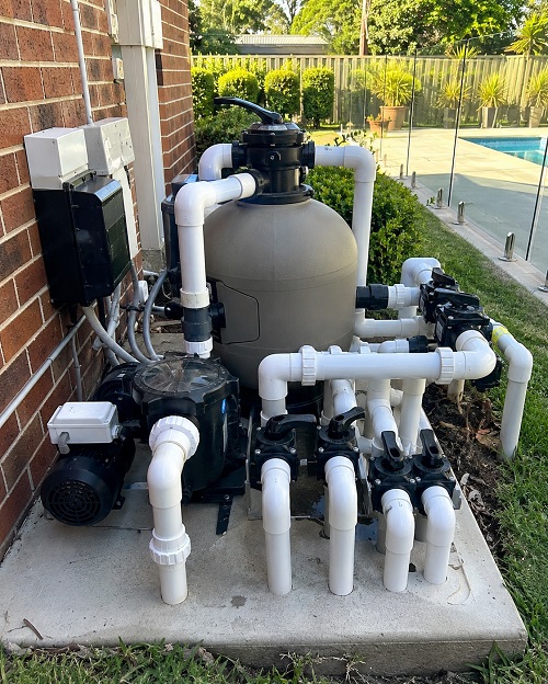 Pool valve replacement and visible equipment pad plumbing in Melbourne