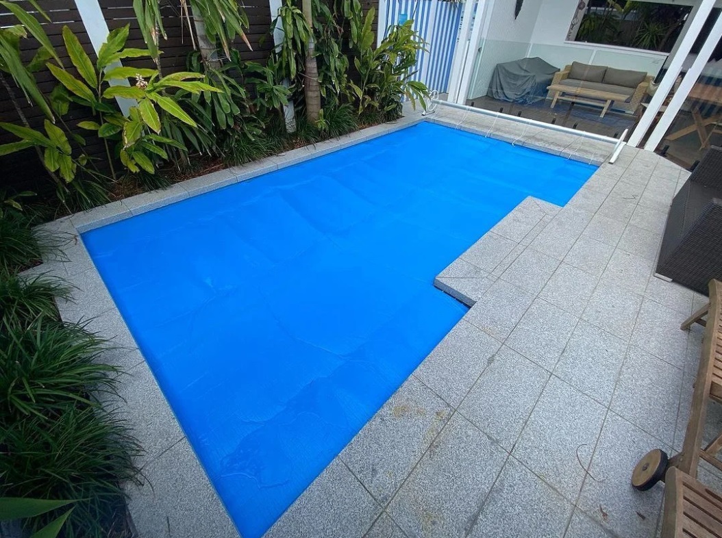 Pool cover roller and blanket edge service example